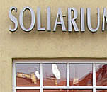 Soliariumų studijos Equador iškaba